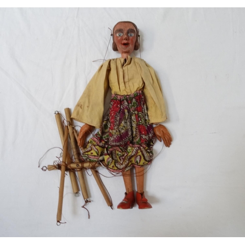 414 - CHILD'S VINTAGE STRING PUPPET
modelled as a lady with a carved wooden head and limbs, 48cm high