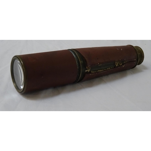 424 - THREE DRAW TELESCOPE
with the War Department stamp, with leather covering and side loops, 92cm exten... 