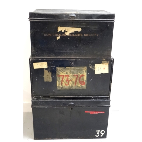 285 - THREE METAL DEED BOXES
one marked Dunfermline Building Society with a lift up lid and side carrying ... 