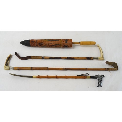 270 - SEGMENTED BAMBOO RIDING CROP
with a horn handle and silver collar, 78.5cm long, a similar riding cro... 