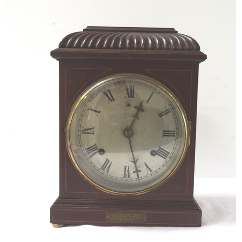 317 - EARLY 20TH CENTURY BRITISH MANTLE CLOCK
in a shaped mahogany case with a circular silvered dial with... 