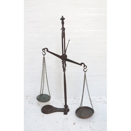 277 - SET OF VICTORIAN CAST IRON SHOP SCALES
the central balance arm with two chain link weighing bowls, r... 