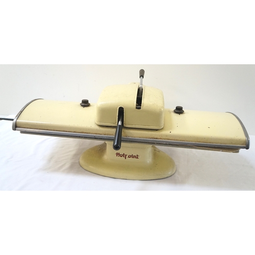 303 - VINTAGE HOTPOINT ELECTRIC IRON PRESS
with shaped panels mounted with dials, 69.5cm wide - RE-OFFERED... 