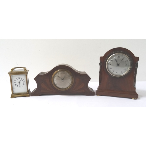 320 - MAHOGANY CASED MANTLE CLOCK
with an arched case with bead decoration around the circular silvered di... 