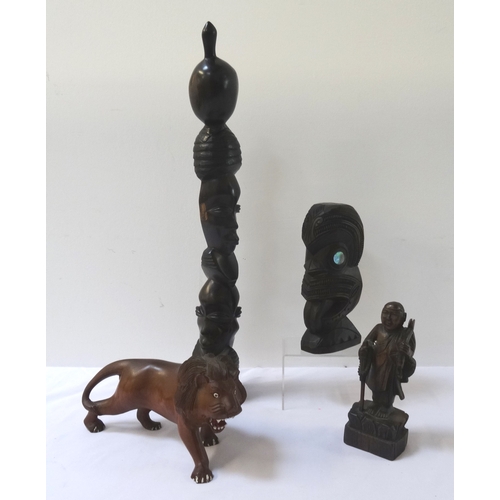 324 - CARVED HARDWOOD AFRICAN LION
roaring, 26cm long; a Thai carving of a wise man holding a staff, raise... 