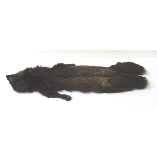 400 - VINTAGE FOX STOLE
with clip closure and with head, tail and legs, 144cm long, together with another ... 