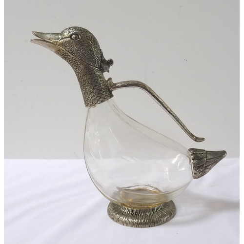 245 - NOVELTY CLARET JUG
modelled as a duck with an opening beak pourer metal head, handle, tail and circu... 