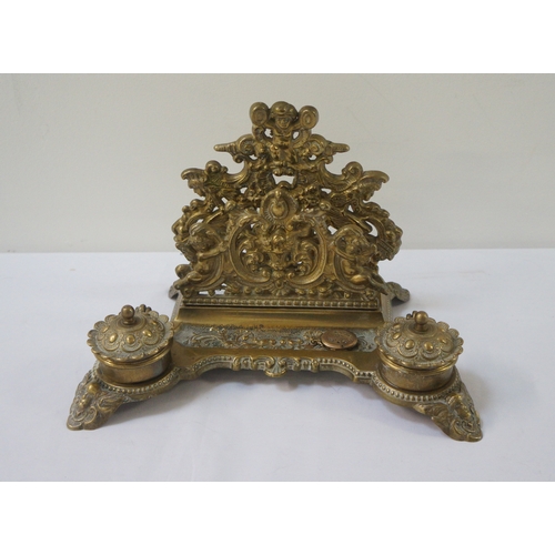 329 - VICTORIAN STYLE BRASS DESK STAND
with scrolled and figural pierced decoration, letter rack, pen tray... 