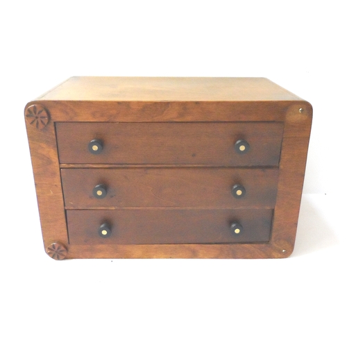 574 - SMALL OAK TABLE TOP CHEST
with three drawers with ebony turned handles inset with mother of pearl, 2... 