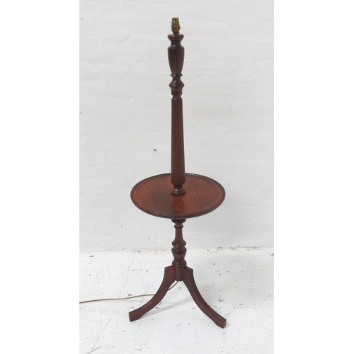 577 - MAHOGANY OCCASIONAL STANDARD LAMP
with a tapering column having a circular mid section shelf, standi... 