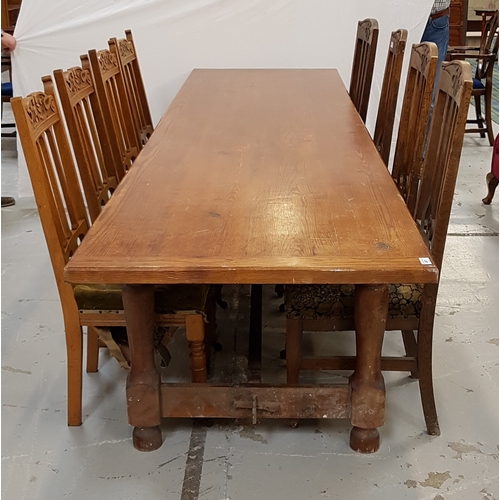 487 - PINE PLANK TOP REFECTORY TABLE
standing on turned supports united by a stretcher, 318cm long