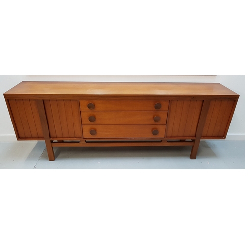 579 - GREAVES & THOMAS TEAK DINING ROOM SUITE
comprising an extending dining table with a pull apart top r... 