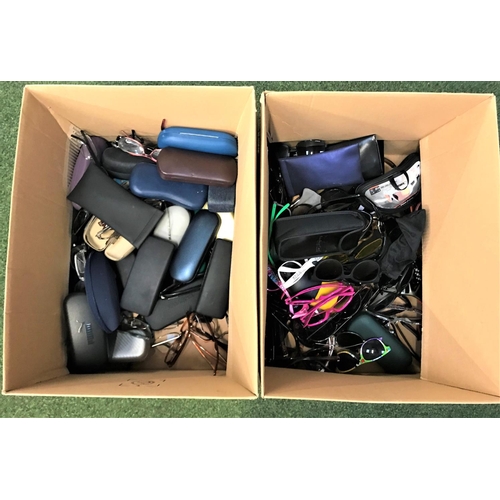 77 - TWO BOXES OF BRANDED AND UNBRANDED SUNGLASSES AND GLASSES
May include prescription lenses.