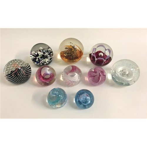 241 - TEN CAITHNESS AND SELKIRK GLASS PAPERWEIGHTS
the eight Caithness examples comprising Polka, Starwatc... 