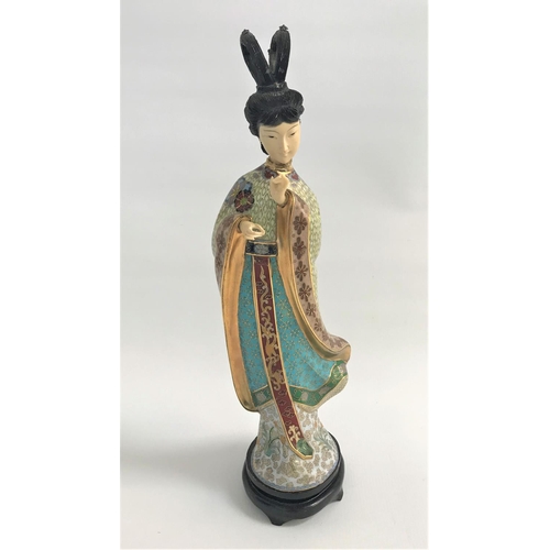 314 - CHINESE CLOISONNE FIGURE
of a lady in flowing robes, on a hardwood stand, 40cm high