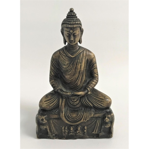 318 - BRASS BUDDHA
seated with crossed legs on a plinth supported by mythical beasts, 20cm high