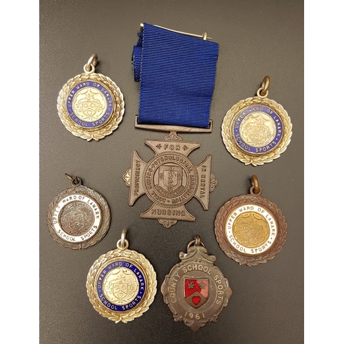 423 - SELECTION OF MEDAL FOBS
relating to the Morrison children including a 1961 County School Sports, 196... 