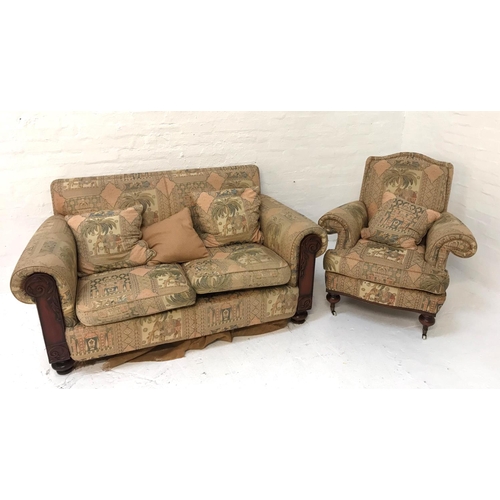 517 - MEDALLION MAHOGANY FRAME TWO SEAT SOFA
with a padded back and scroll arms with loose seat cushions a... 