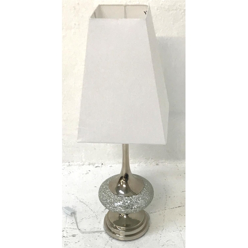 538 - SHAPED STEEL TABLE LAMP
with fragment mirror decoration and a tapering squared white shade, 94cm hig... 