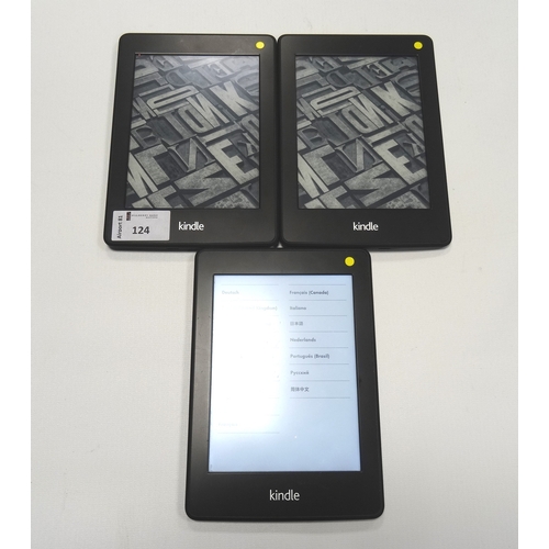 124 - THREE KINDLE PAPERWHITE DEVICES
comprising: two KINDLE PAPERWHITE 2 (2013) WIFI, serial numbers: 901... 