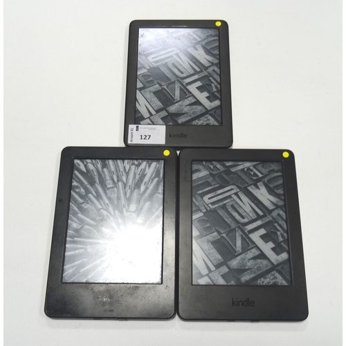 127 - THREE KINDLE BASIC DEVICES
comprising: one KINDLE BASIC 3 (WIFI), serial number: G091 0L04 9112 0AW5... 