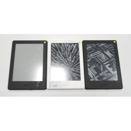 129 - THREE KINDLE BASIC 2 WIFI DEVICES
serial numbers: G000 K905 6447 0L89; G000 KA05 6436 0K4Q; and G000... 