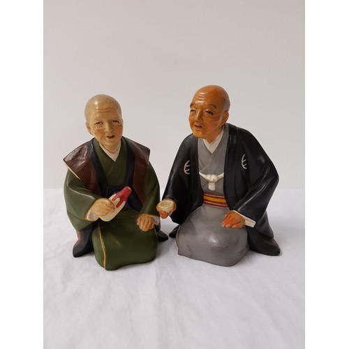 225 - TWO JAPANESE URASAKI DOLLS PORCELAIN FIGURINES
depicting two kneeling men in traditional dress, one ... 