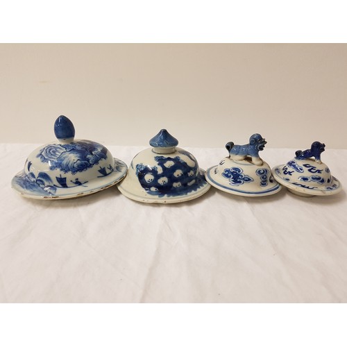 226 - FOUR CHINESE PORCELAIN LIDS
each of circular form, two with dog finials and two with shaped finials,... 