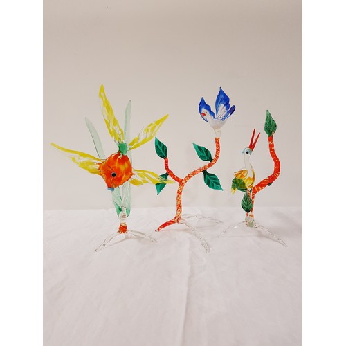 243 - SELECTION OF HAND BLOWN GLASS ANIMALS
including a swan in flight, heron, dove in a tree, two seated ... 