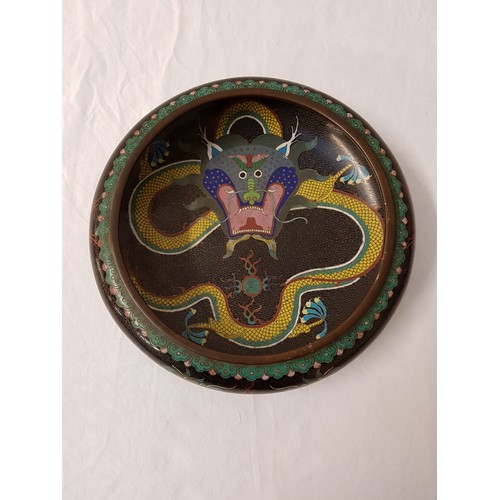 315 - CLOISONNE BOWL
with a folded rim, decorated to the interior with a large dragon, the exterior with f... 