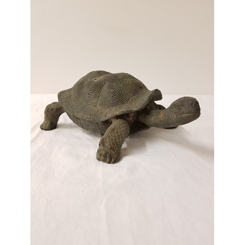 324 - EARLY 20TH CENTURY BRASS TORTOISE
with a verdigris finish, 26.5cm long