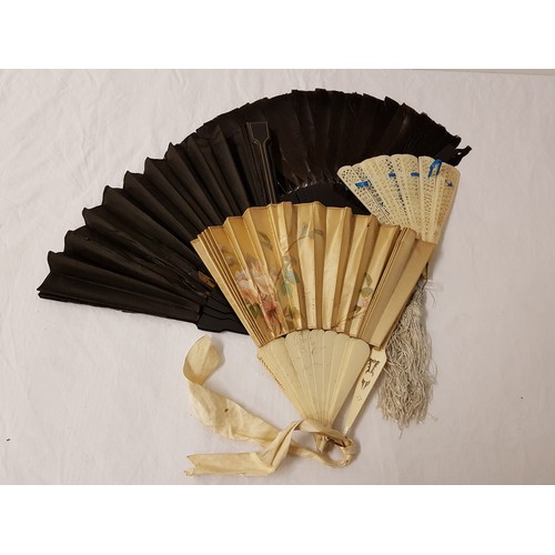 341 - LADIES CONTINENTAL FEATHER FAN
with ebonised sticks, an Italian tourist fan, the leaves covered in f... 