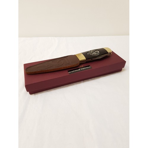 426 - OFFICERS SGIAN DUBH
with an Indian ebony handles with an inset pewter thistle and a combination scre... 