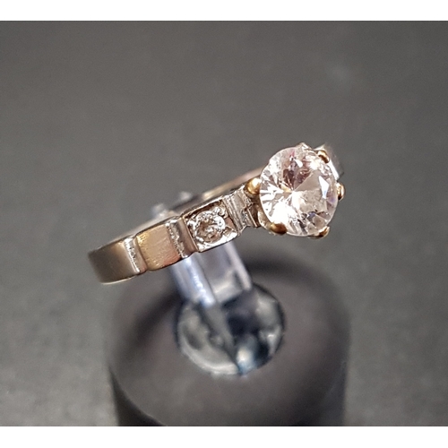 84 - CZ SOLITAIRE RING
on Egyptian eighteen carat white gold shank with further small CZ stones to the sh... 