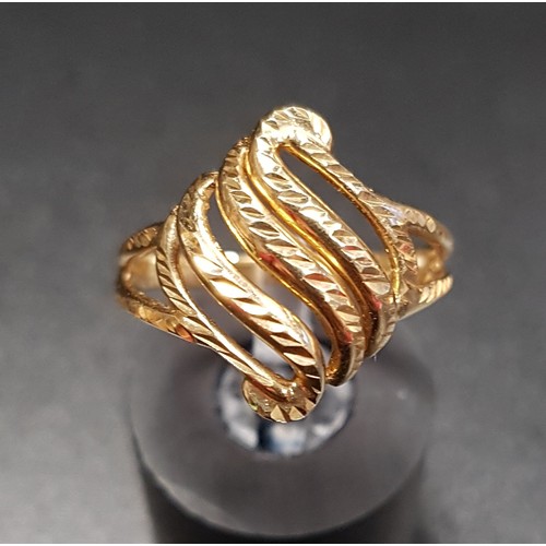 128 - TEN CARAT GOLD RING
with pierced scroll detail, ring size N