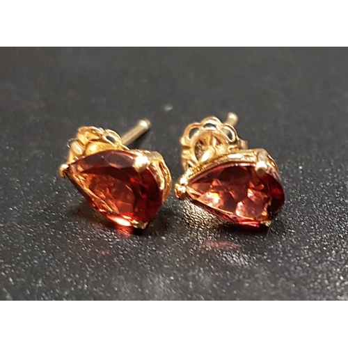 75 - PAIR OF GARNET STUD EARRINGS
the garnets in unmarked gold mounts with fourteen carat gold butterflie... 