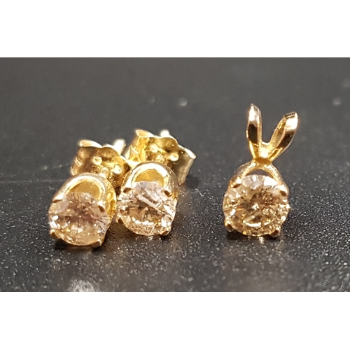 80 - DIAMOND SUITE OF JEWELLERY
comprising a pair of solitaire earrings and a single stone pendant, all i... 