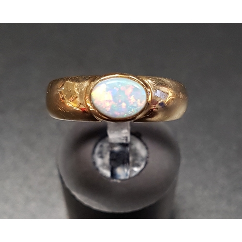 119 - OPAL SINGLE STONE RING
the bezel set opal on nine carat gold shank, ring size L-M