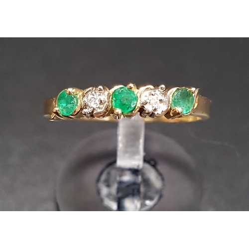 133 - EMERALD AND DIAMOND FIVE STONE RING
the alternating diamonds and emeralds on ten carat gold shank, r... 