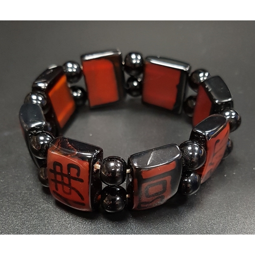 162 - AGATE AND ONYX BRACELET
the eight rectangular panels with linear decoration and separated by double ... 