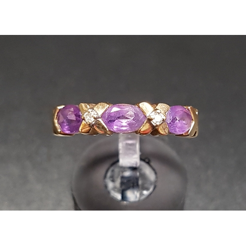 181 - AMETHYST AND DIAMOND RING
the three oval cut amethysts separated by diamonds in X settings, on ten c... 