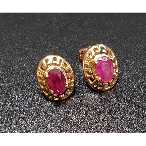 120 - PAIR OF RUBY STUD EARRINGS
the oval cut rubies in pierced unmarked gold mounts, with ten carat gold ... 