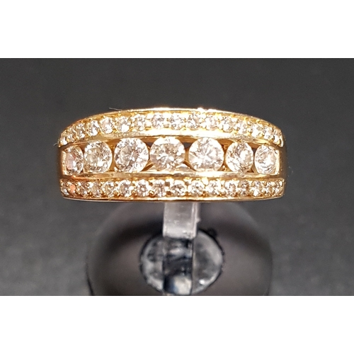 142 - MULTI DIAMOND SET RING
the central row of seven diamonds totalling approximately 0.6cts, with a furt... 