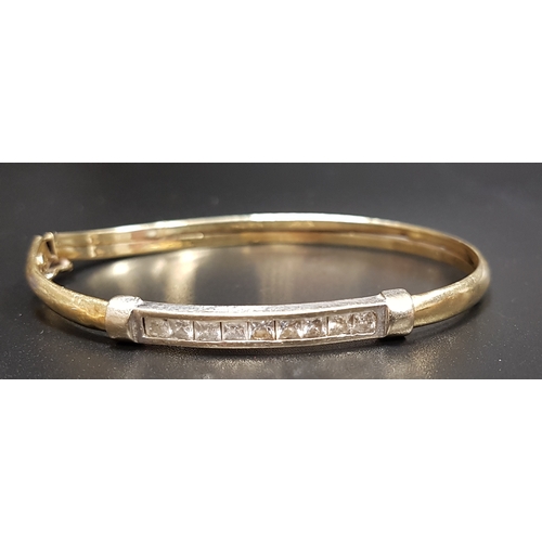 151 - CZ SET NINE CARAT GOLD BANGLE
approximately 7.5 grams