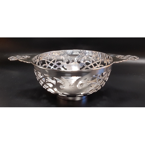 210 - GEORGE V PIERCED SILVER CENTRE BOWL
in the form of a quaich, Sheffield 1934, 348 grams