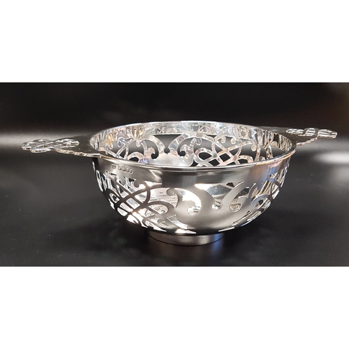 210 - GEORGE V PIERCED SILVER CENTRE BOWL
in the form of a quaich, Sheffield 1934, 348 grams