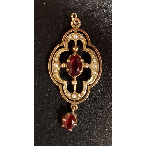 131 - RED GEM AND SEED PEARL SET PENDANT
the quatrefoil shaped pendant with small drop, in nine carat gold