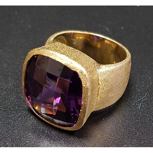 182 - PURPLE CZ SET SILVER DRESS RING
the ring with brushed gilt finish