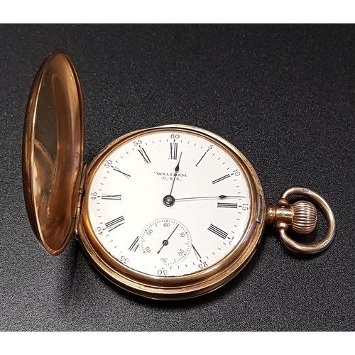 185 - NINE CARAT GOLD CASED WALTHAM POCKET WATCH
the white enamel dial with Arabic numerals and subsidiary... 