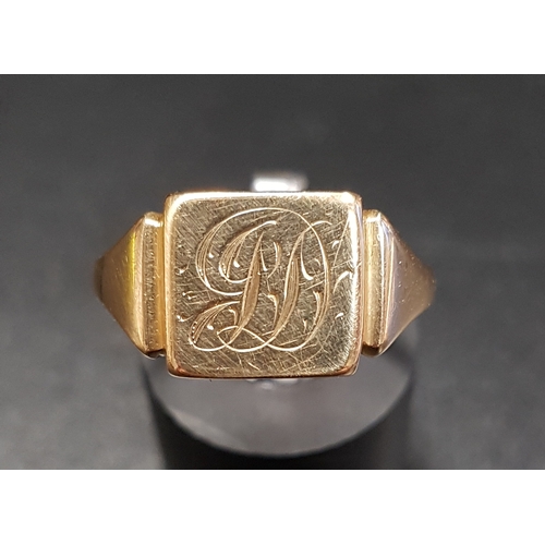 189 - EIGHTEEN CARAT GOLD SIGNET RING
with engraved scroll monogram, ring size R and approximately 3.3 gra... 